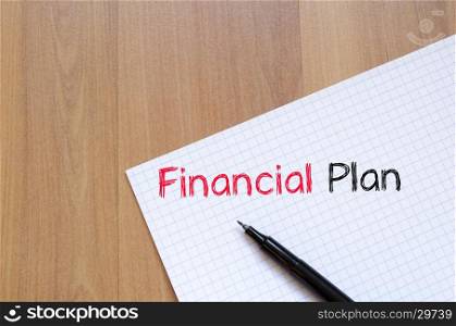 Financial plan text concept write on notebook