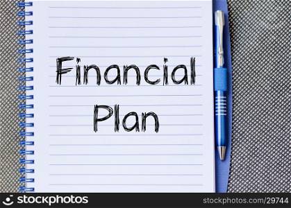 Financial plan text concept write on notebook