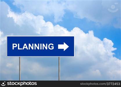 financial planning on blue road sign with blue sky