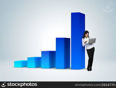 ""Financial report &amp; statistics. Business success concept. Business woman with notebook stands by the bar graph.""