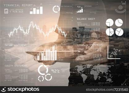 Financial report data of business operations (balance sheet and income statement and diagram) as Fintech concept.Double exposure of success businessman using digital tablet with London building.
