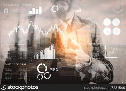 Financial report data of business operations (balance sheet and income statement and diagram) as Fintech concept.Double exposure of success businessman holding digital tablet computer with London building.