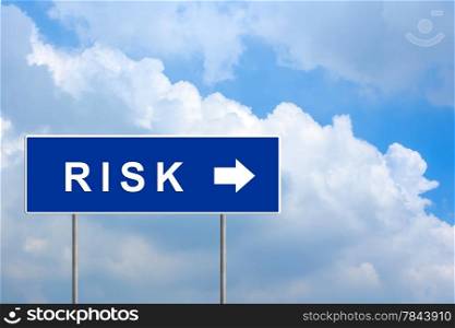 financial risk on blue road sign with blue sky