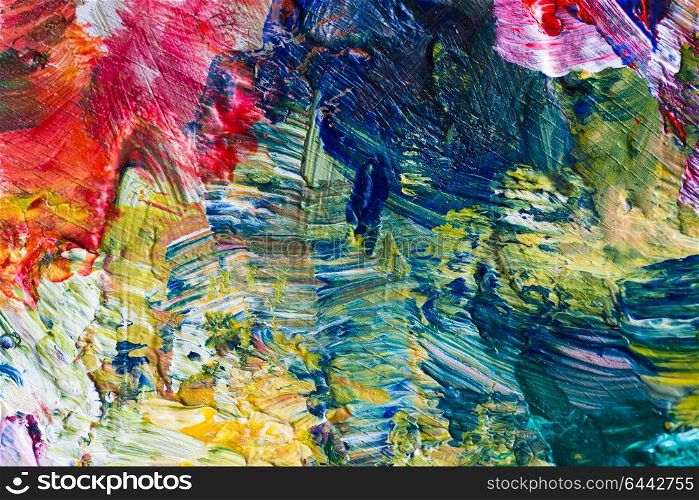 fine art, creativity and concept - close up of palette with colorful paint strokes. close up of art palette with colorful paint
