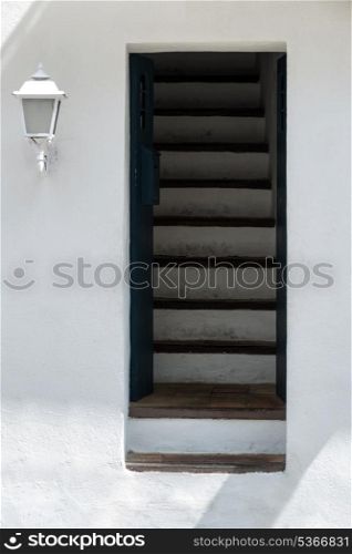 Fine art image of Mediterranean style door with stairs leading inside