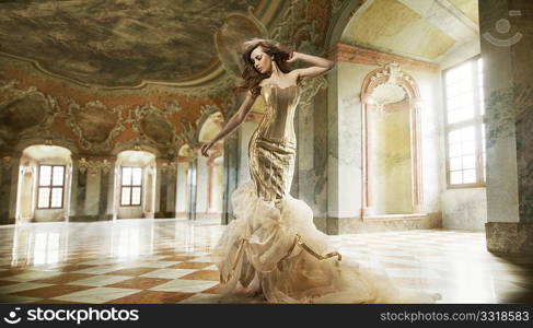 Fine art photo of a young fashion lady in a stylish interior