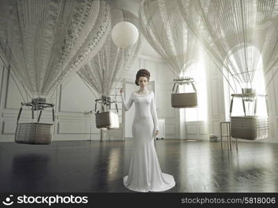 Fine art photo of a young fashion woman in a stylish interior
