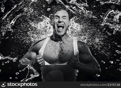 Fine art photo of a young strongman screaming
