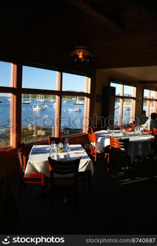 Fine dining with harbor view at sunset, Southwest Harbor, Mount Desert Island, Acadia National park, Maine, New England