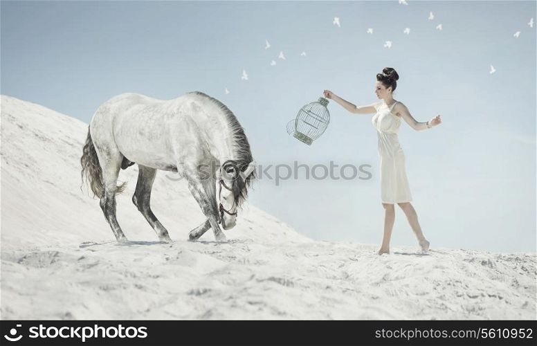 Fine shot of the sensual lady with the white horse