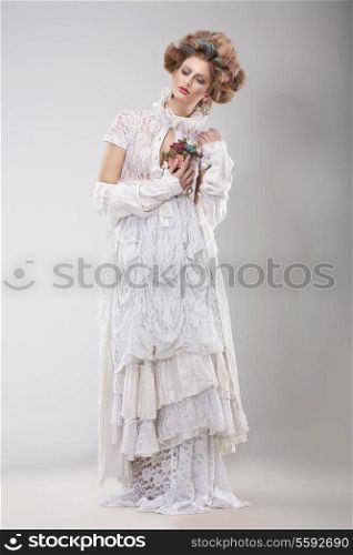 Finery. Glamorous Lady in Elegant Lacy Dress