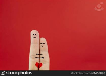 Finger art couple hugging softly