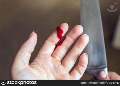 Finger cut, bleeding injured with knife, Flesh blood wound in hand close-up. Finger cut, bleeding injured with knife, Flesh blood wound in hand