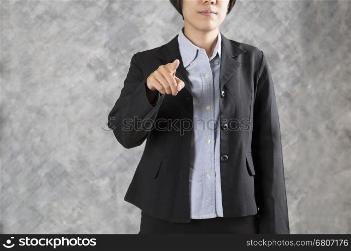 finger of businesswoman pointing to you for use as hand pushing touch screen, pressing digital virtual button