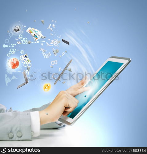 Finger touch. Close up image of human hand touching screen of tablet pc