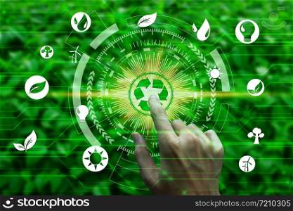 Finger touch with environment icons over the Network connection on nature background, Technology ecology concept.