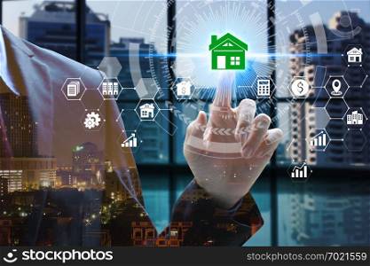 Finger touch with property investment Icons over the Network connection on property background, Property investment concept.