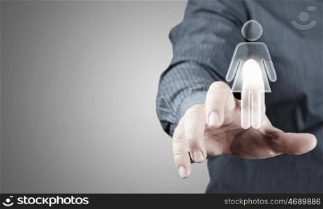 Finger touching icon. Close up of businessman hand touching icon on screen