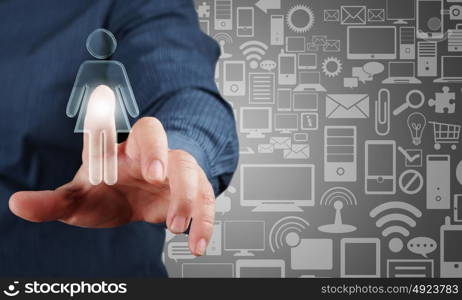 Finger touching icon. Close up of businessman hand touching icon on screen