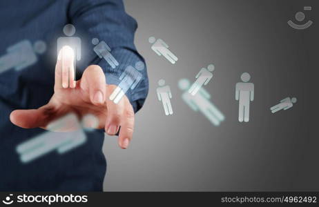 Finger touching icon. Close up of businessman hand touching icon on screen