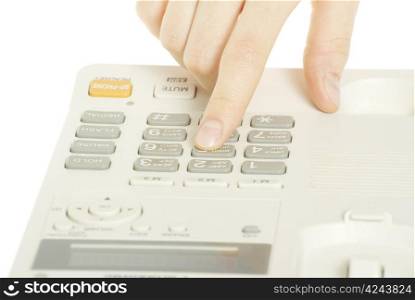 finger with white telephone keypad