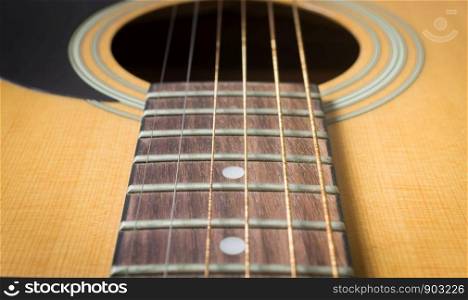 Fingerboard and Inlay and Old Acoustic Guitar String with Sound Hole and Pickguard
