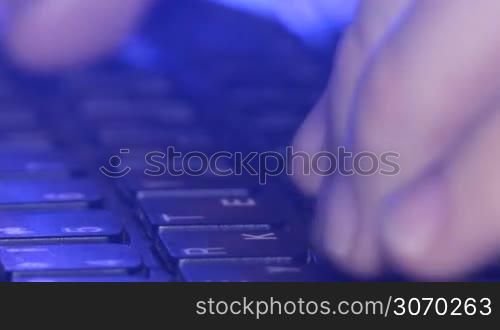 fingers tapping on the keyboard