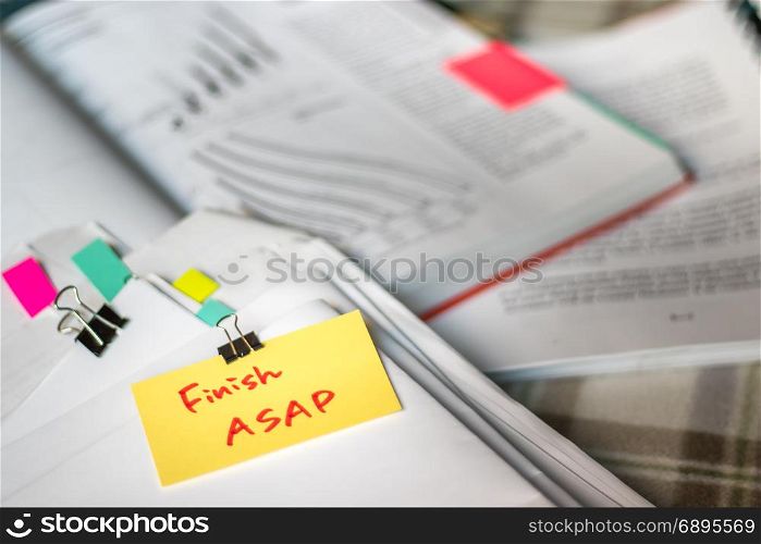 Finish ASAP; Stack of Documents with Large Amount of Analytic Material.