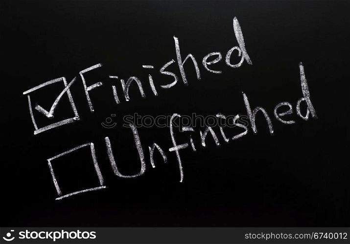 Finished and unfinished check boxes on a blackboard