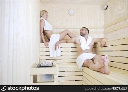 finland sauna warming up and healing in a spa wellness resort cabin with young couple
