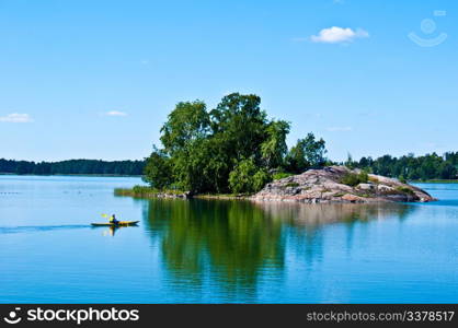 Finnish scenery. peaceful finnish scenery in Helsinki with a canoe in the distance