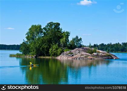 Finnish scenery. peaceful finnish scenery in Helsinki with a canoe in the distance