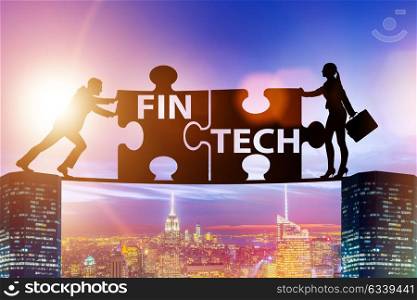 Fintech financial technology concept with puzzle pieces