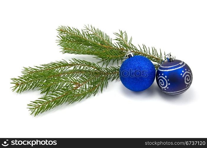 fir branch with christmas baubles. isolated on white