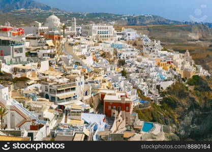 Fira, modern capital of the Greek Aegean island, Santorini, in the summer day, Greece. Fira, main town of Santorini, Greece