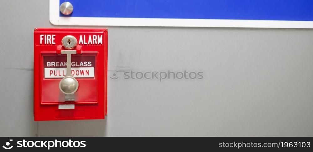 Fire alarm switch on the wall, powerful emergency equipment for industrial and residential