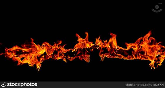 Fire flames on abstract art black background, Burning red hot sparks rise, Fiery orange glowing flying particles