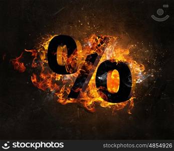 Fire percentage symbol. Percent sign in fire flames on dark background