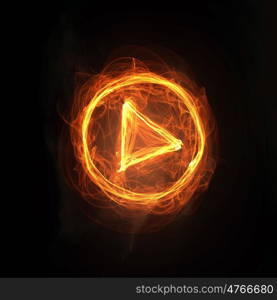 Fire play icon. Glowing fire play icon on dark background