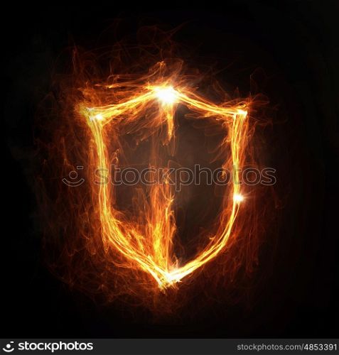 Fire shield icon. Glowing fire shield icon on dark background