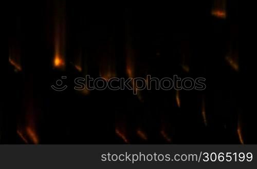 Fire trails over black background
