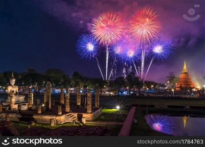 Fire works at Sukhothai Historical Park during Loy Krathong Light and Candle Festival, Wat Mahathat Temple in the precinct of Sukhothai Historical Park, a UNESCO World Heritage Site in Thailand.. Fire works at Sukhothai Historical Park.