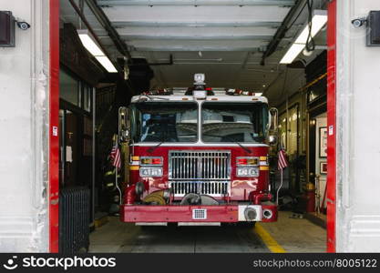 Firefighter Truck Parked in the Fire Station