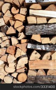 firewood in stack of logs