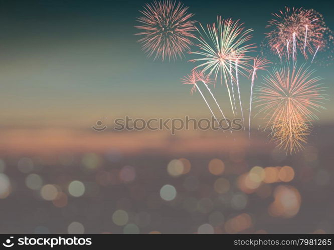 Firework on blurred twilight sky background with colorful city lights bokeh. Vintage filter effect image