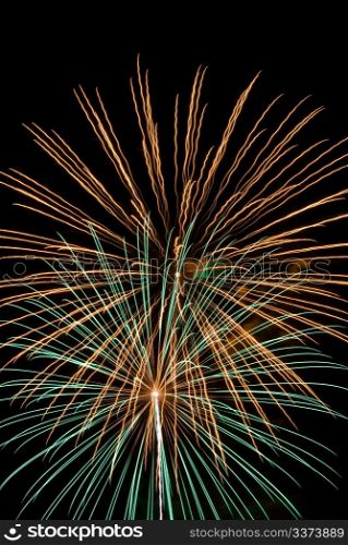 Firework streaks in the night sky during celebrations.