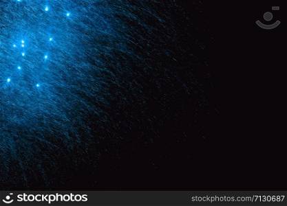 Fireworks abstract on dark background. Colorful firework on the night sky. New Year celebration fireworks. Abstract firework on black background with free space for text