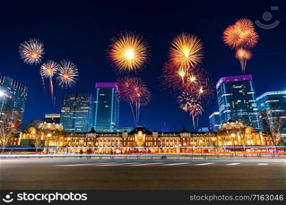 Fireworks celebrating over Tokyo station at night, Japan