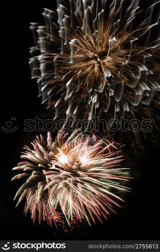 Fireworks. Celebratory salute. Bright fires on a black background