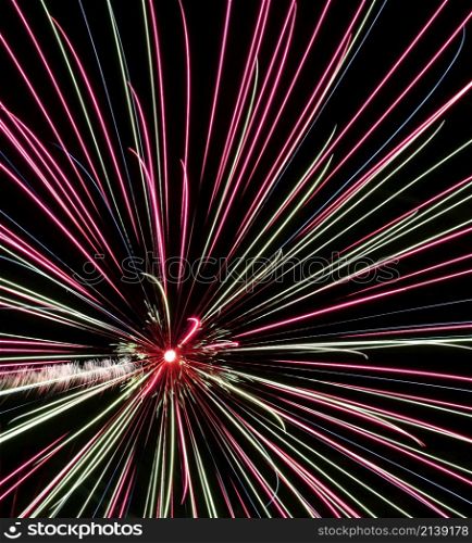 fireworks,colored splashes of light against a dark background. fireworks,colored splashes